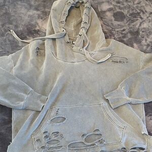 NSF distressed grey hoody with holes.